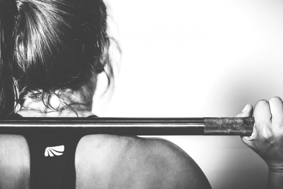 Person training with a barbell